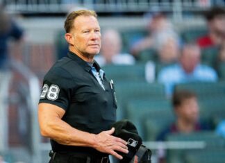 Umpire Jim Wolf exits Royals-Mariners after foul ball off mask