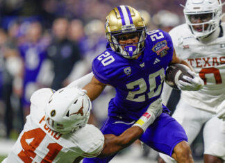 University of Washington football player arrested, charged with raping 2 women