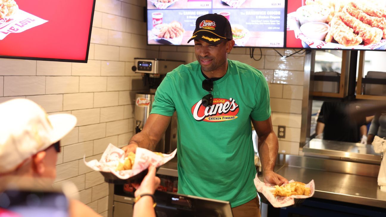 Al Horford hands out food to fans at Raising Cane’s in Boston