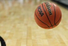 USF has named an interim coach following the death of Amir Abdur-Rahim