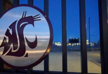 Washington State removed interim tag, named Anne McCoy AD