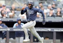 Dodgers bring back infielder Amed Rosario in trade with Rays