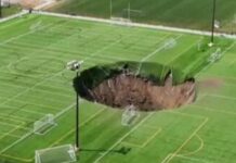 Huge sinkhole ‘100ft deep’ opens up in middle of Illinois football pitch | US News
