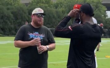 Luke Combs stops by Cincinnati Bengals practice on Thursday