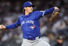 Jays’ Gausman (back) pulled after 5 no-hit innings against Rangers