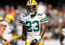 Packers’ Jair Alexander scores a touchdown after Titans’ Will Levis intercepts him.