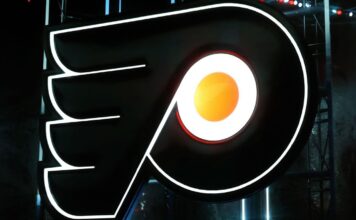 Guy Gaudreau, father of John and Matthew, helps out at Flyers practice