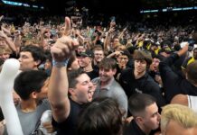 Fans storm court after UCF jabs upset of Texas A&M in SEC