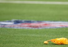 NFL mulls allowing replay officials to throw flags