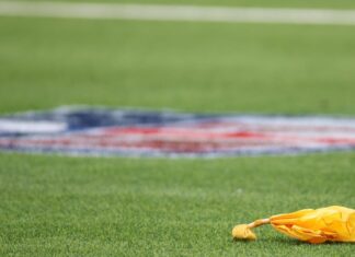 NFL mulls allowing replay officials to throw flags