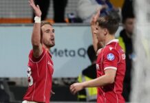 Wrexham overcome illness to cement Championship playoff spot