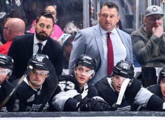 Kings lose 1st game since firing coach; Avs first to 40 wins