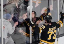 Charlie McAvoy loses teeth, then wins game for Bruins in OT