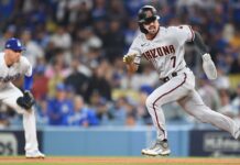 D-backs’ Carroll makes spring debut, says hand ‘felt fine’