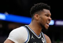 Sources: Giannis to miss at least 1 week due to knee injury