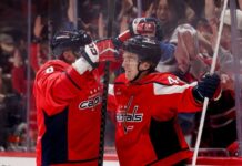 Caps’ Cole Hutson nets first NHL goal despite debut jitters