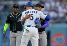 Dodgers’ Freeman laughs off being tagged out by Marte with hug