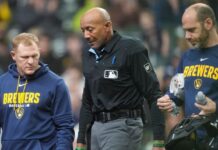 Umpire Bucknor leaves Rays-Brewers after foul tip hits mask