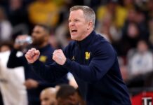 Dusty May happy at Michigan, won’t talk about UNC job