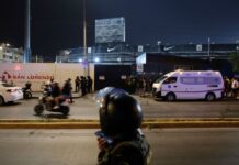 At least one dead, 60 injured, in crush of soccer fans in Peru stadium