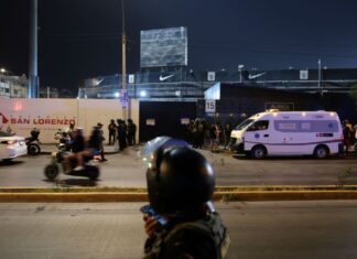 At least one dead, 60 injured, in crush of soccer fans in Peru stadium