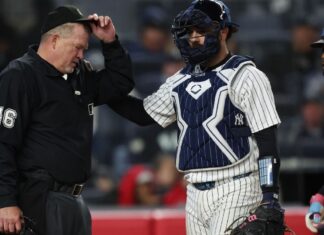 Umpire Ron Kulpa leaves Marlins-Yankees after foul ball hits mask