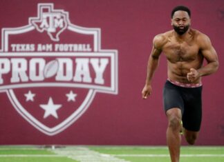 Cowboys visit with Emmitt’s son, Texas A&M RB E.J. Smith