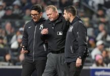 Umpire Ron Kulpa out with concussion after hit to mask